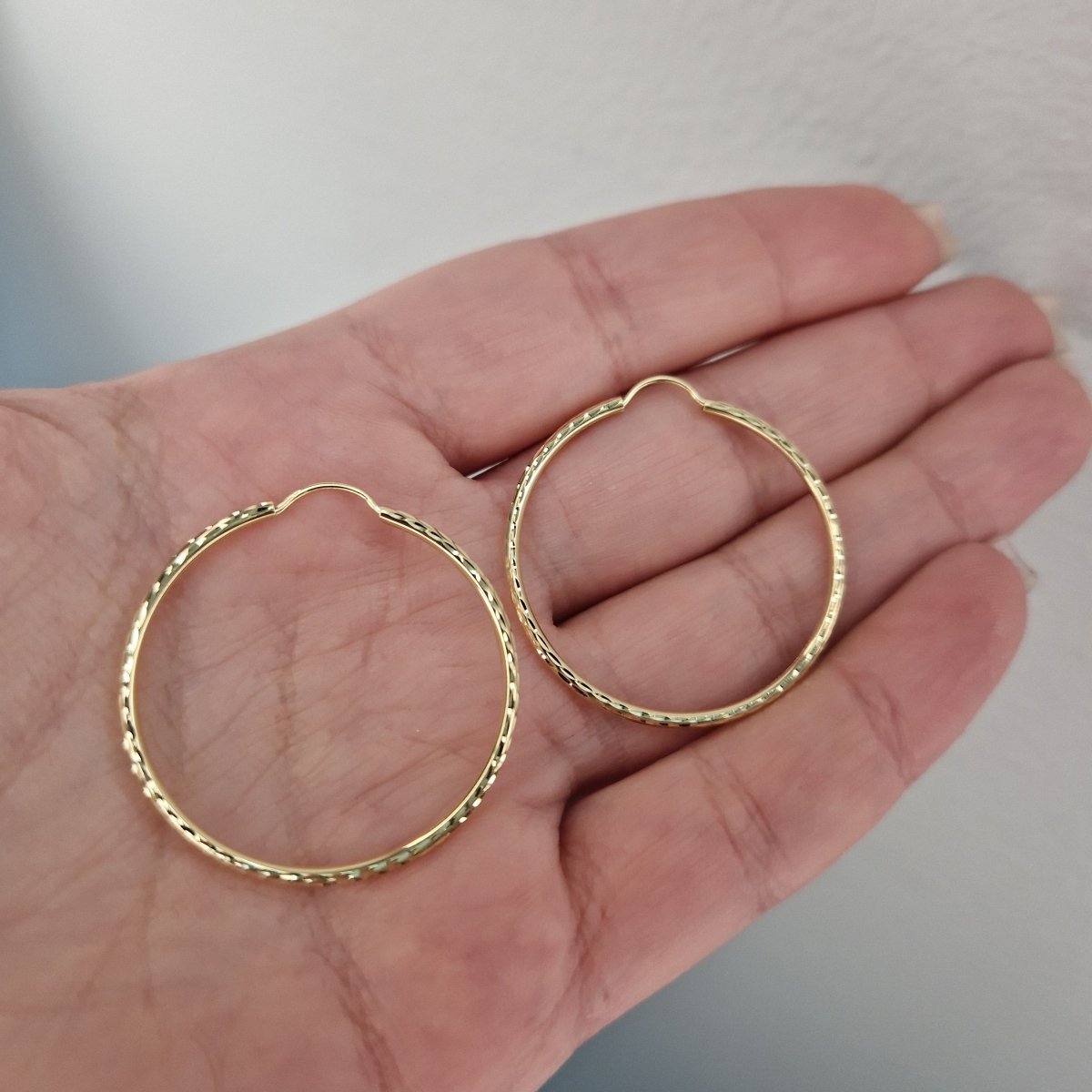 Creoler 18k guld facetterade 30mm
