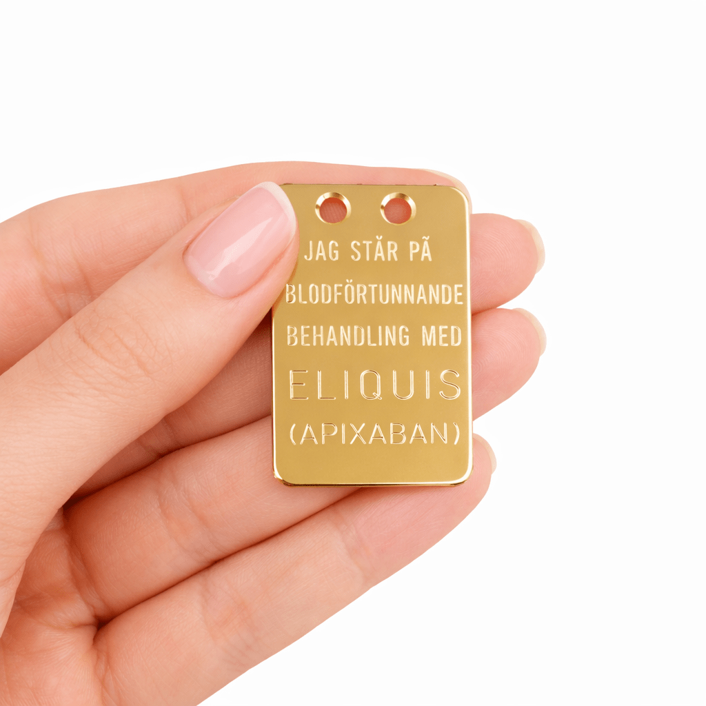 Eliquis bricka i förgyllt silver