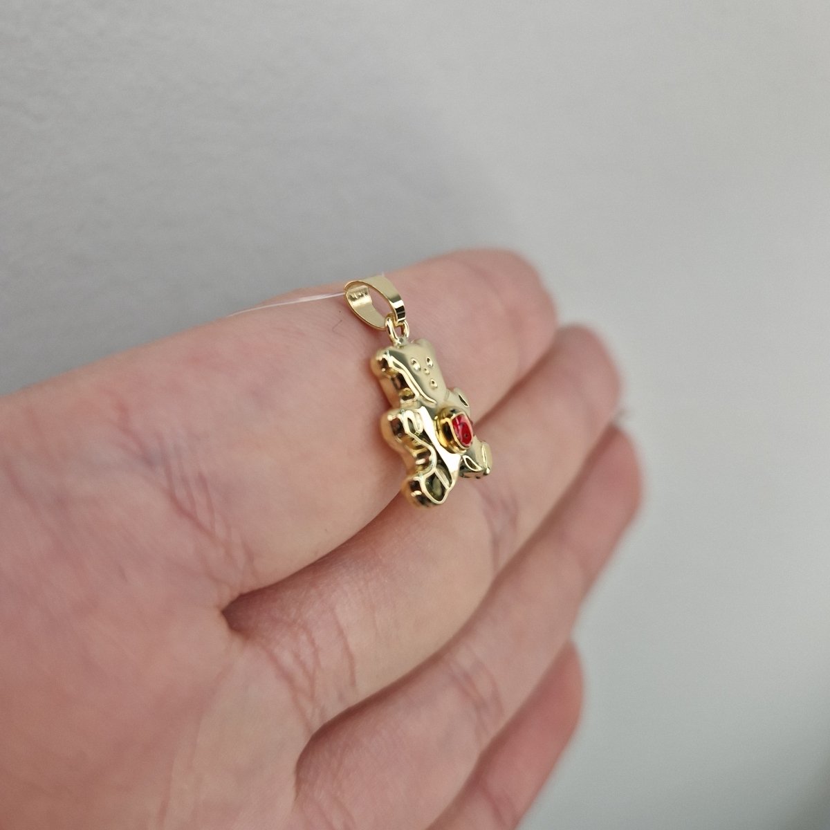 Hängsmycke nalle 18k guld med nyckelpiga