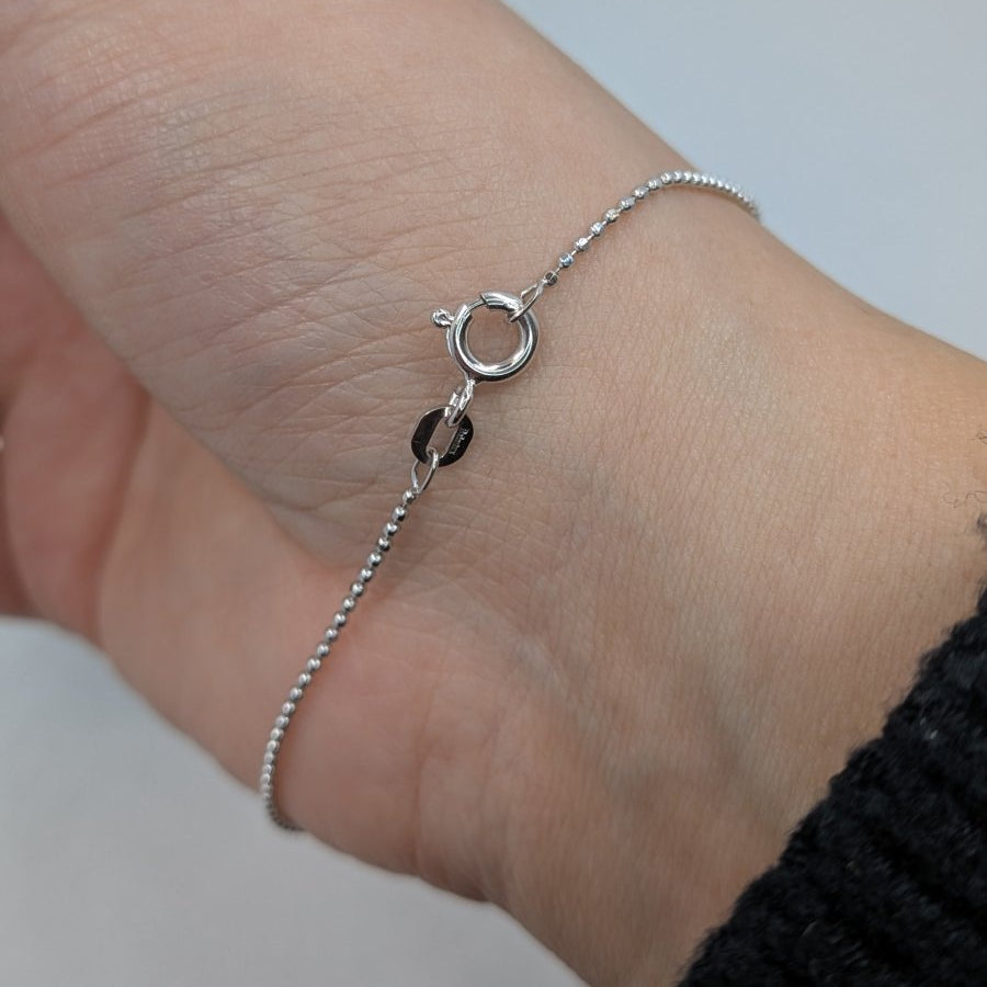 Armband kullänk facetterad i 18k vitguld