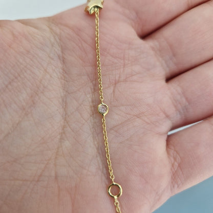 Barn armband 18k guld med stjärna och stenar