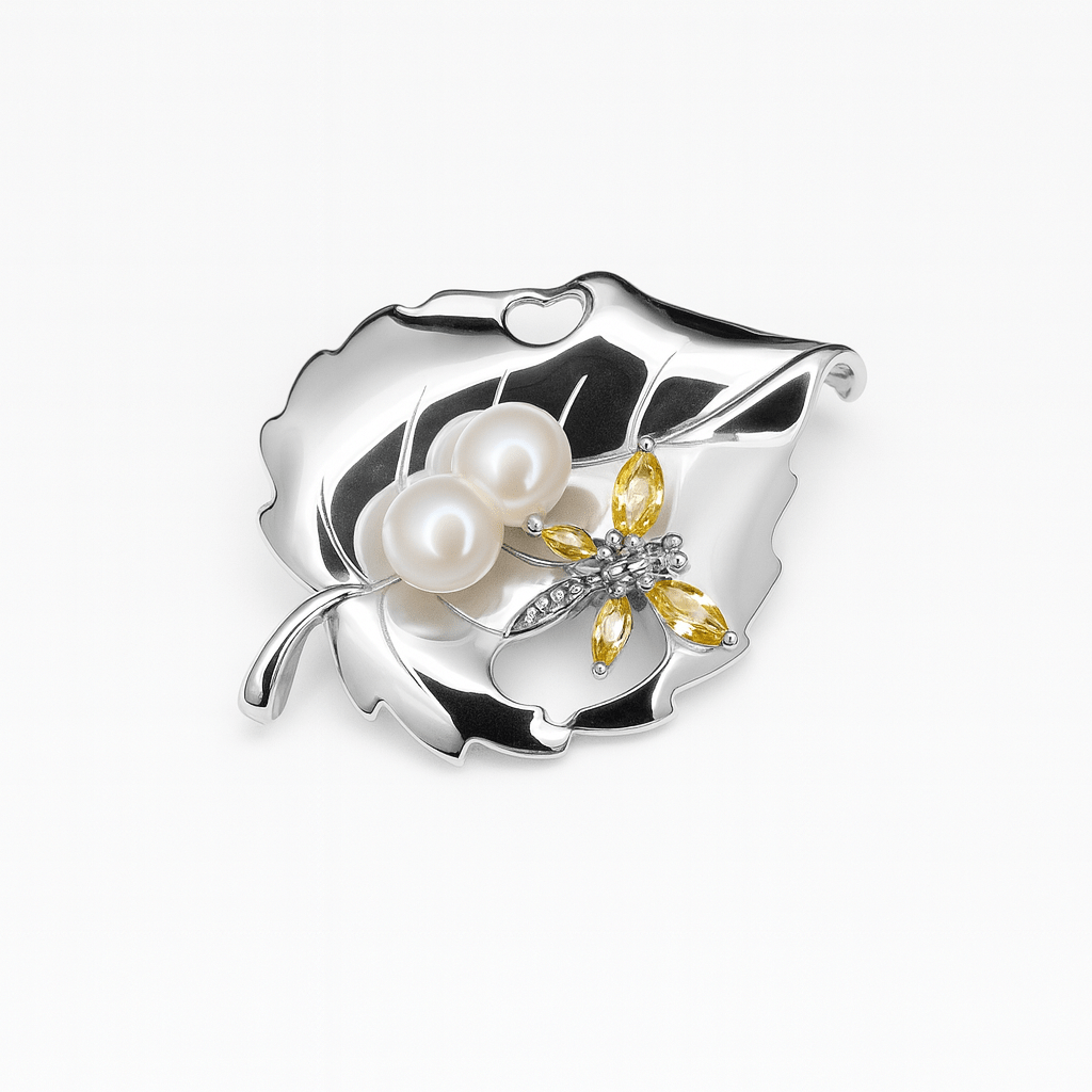 Brosch löv med fjäril i äkta silver