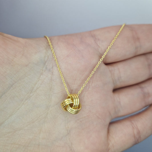 Förgyllt halsband med knut