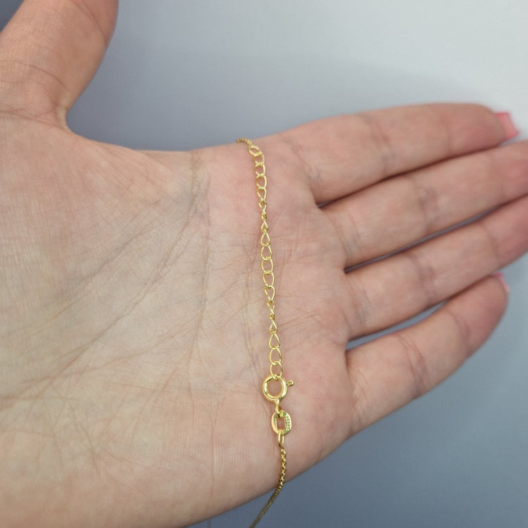 Förgyllt halsband med knut