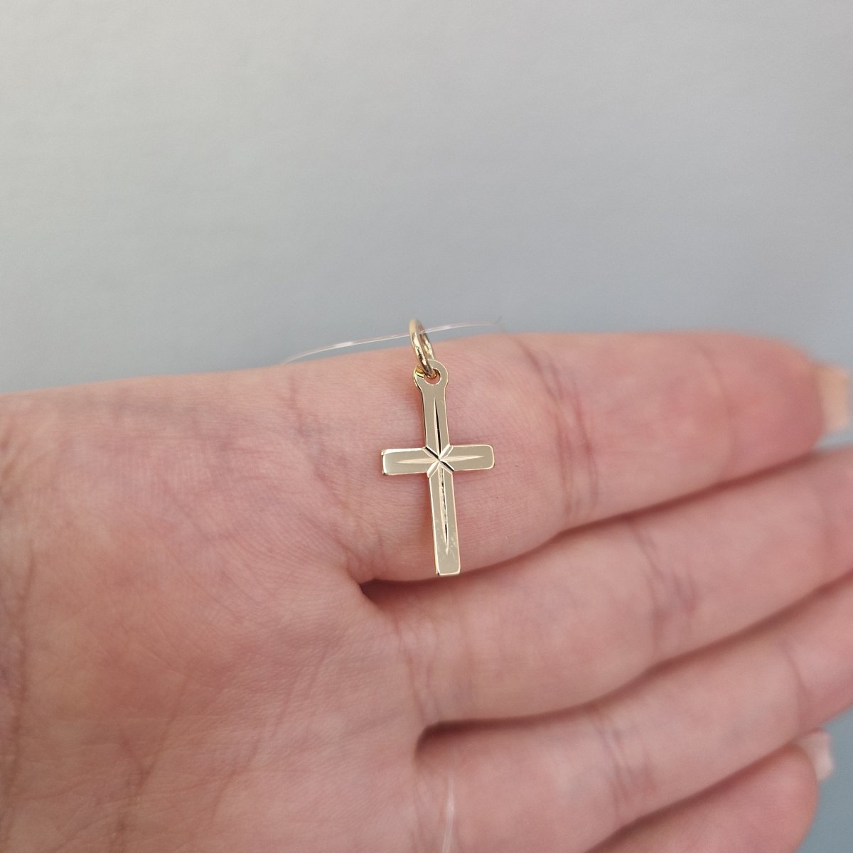 Guld kors facetterad 17x9mm