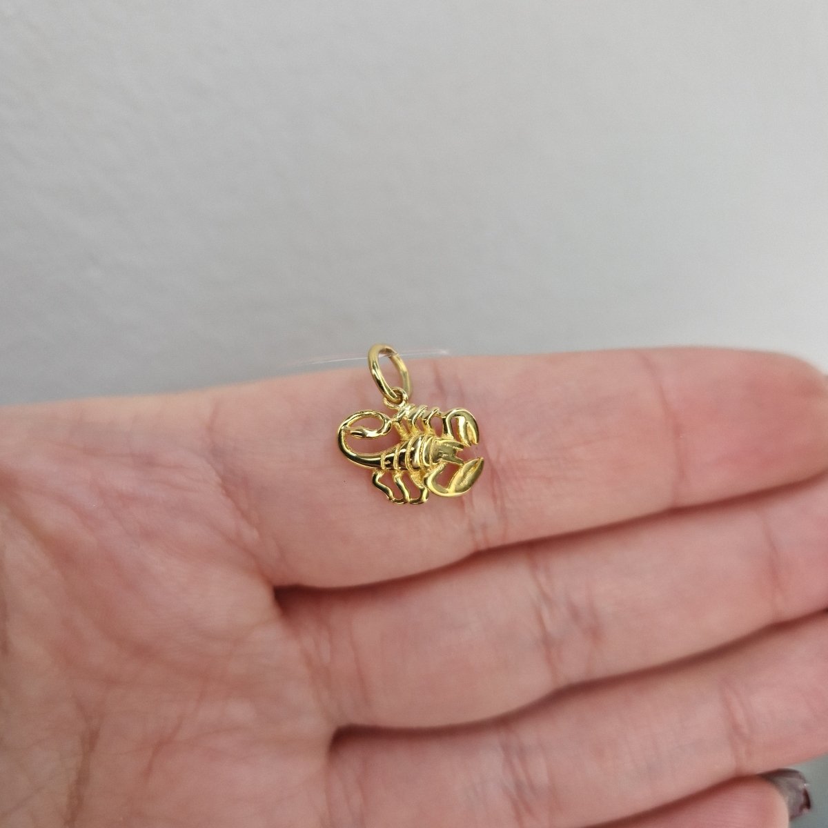 Guldhänge Stjärntecken figur massivt 18k guld