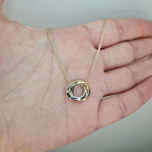 Halsband med cirklar i tvåfärgat 18k guld