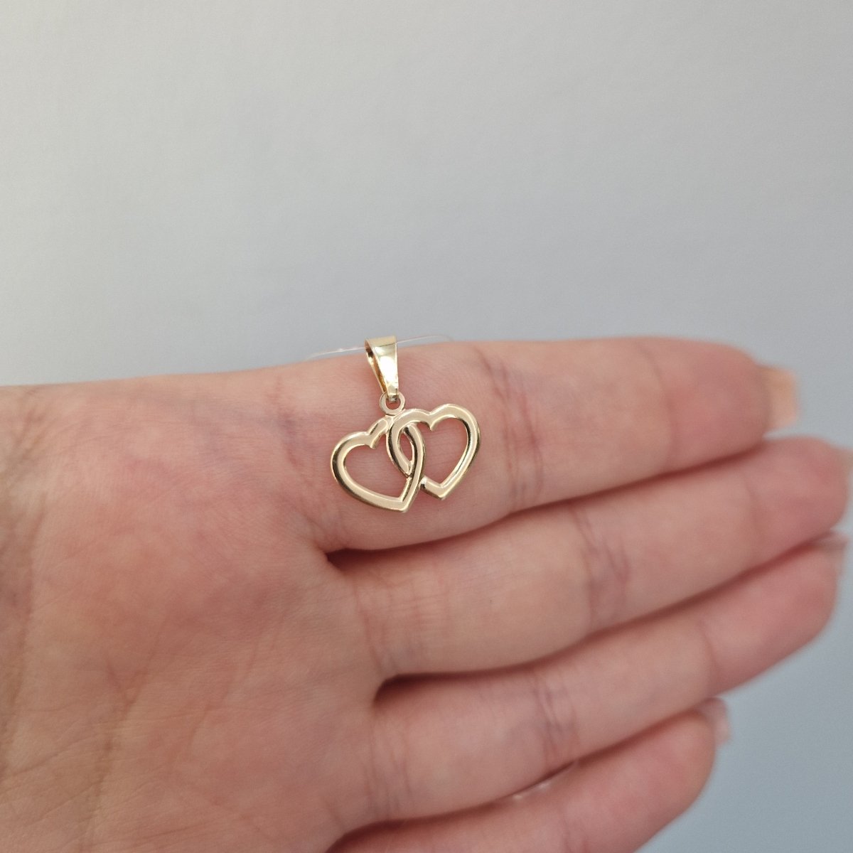 Hängsmycke dubbla hjärtan i 18k guld