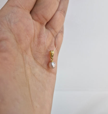 Hängsmycke i 18k guld - med odlad pärla i ljusrosa