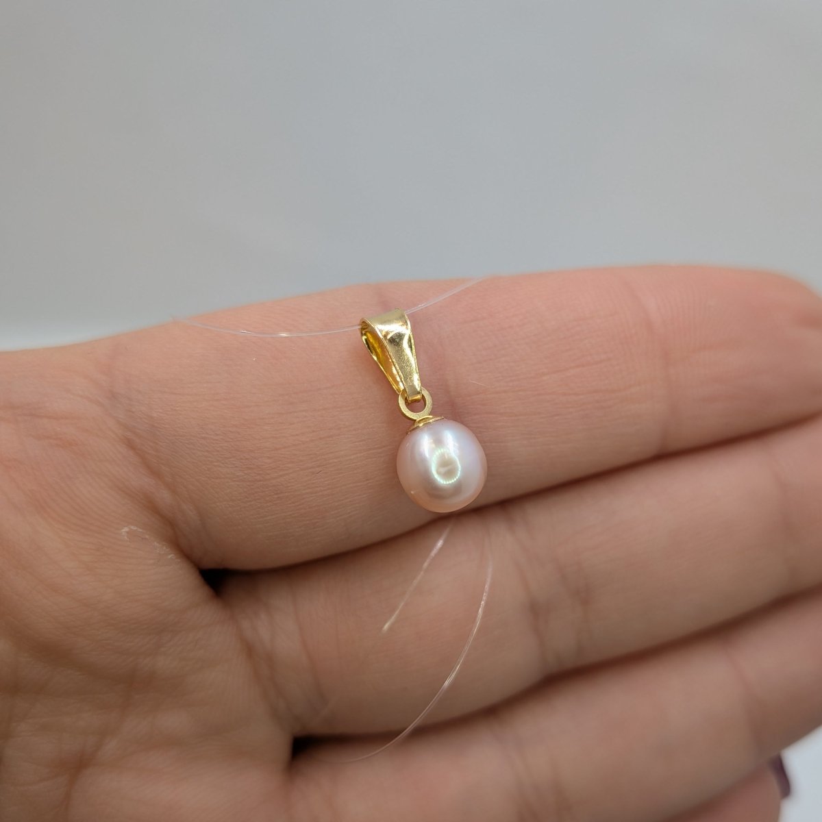 Hängsmycke odlad pärla i äkta guld