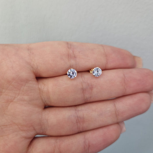 Örhängen 18k guld med ljuslila rund sten