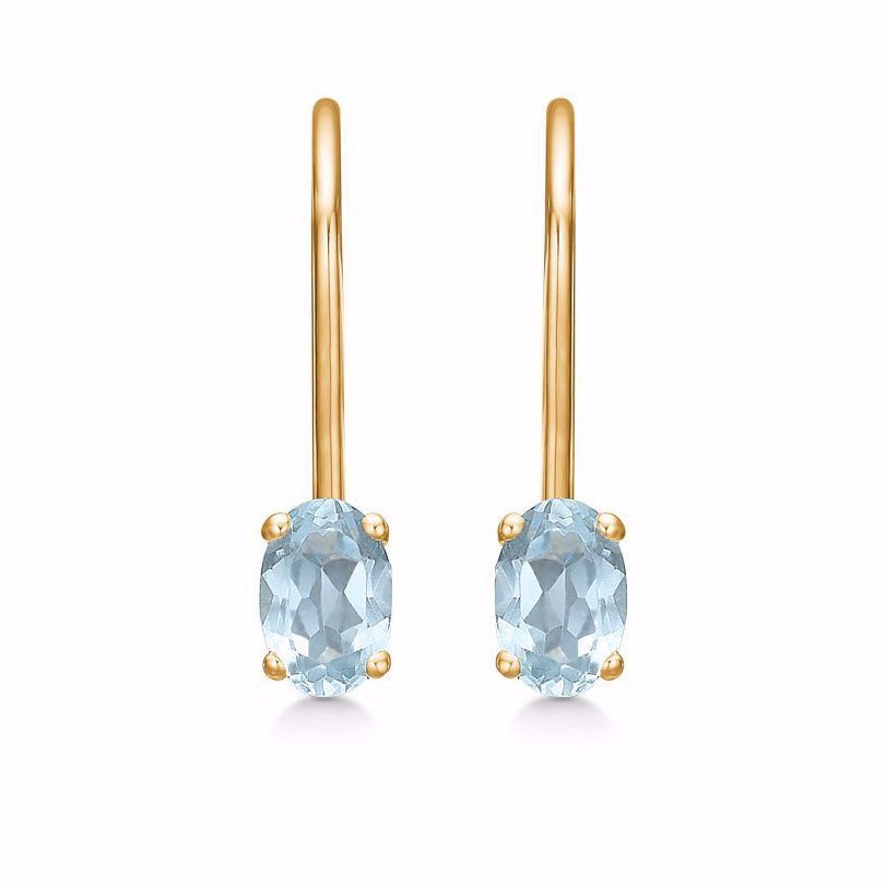 Guldörhängen med blå Topas