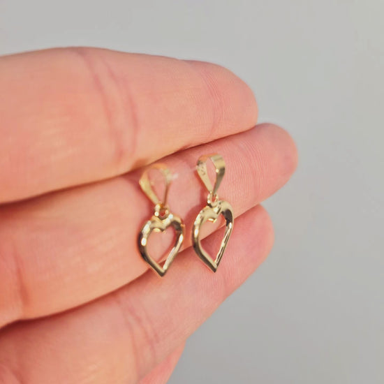 Ett genombrutet hjärta 11 mm. Tillverkad i 18k guld.