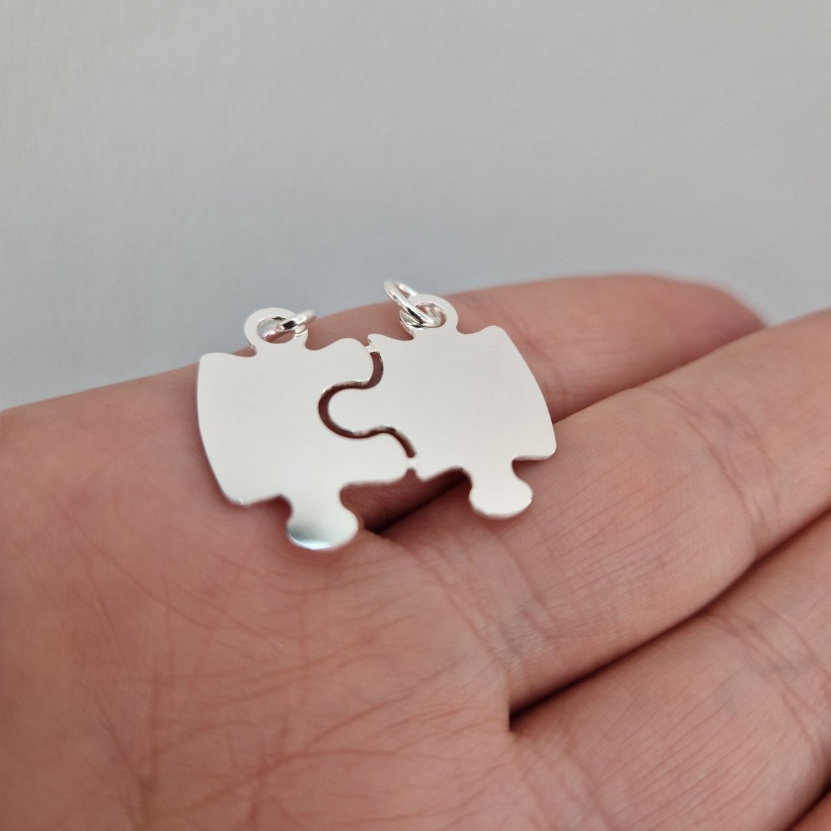 Hängsmycke brytbara pusselbitar i äkta silver