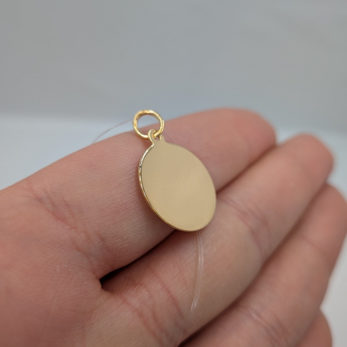 Rondell i förgyllt silver 16*16mm