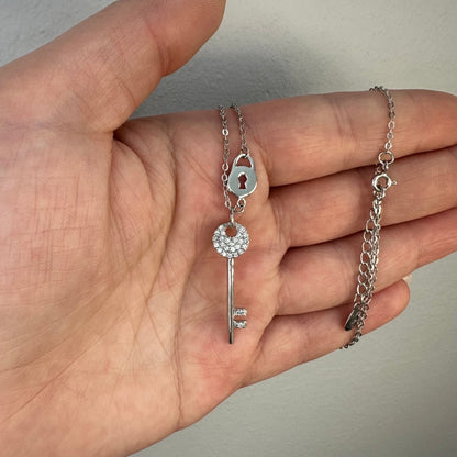 Silverhalsband, Nyckel & lås