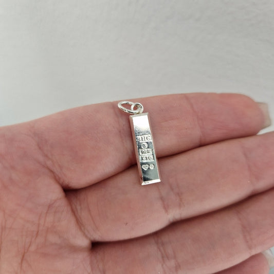 Silvertacka hängsmycke