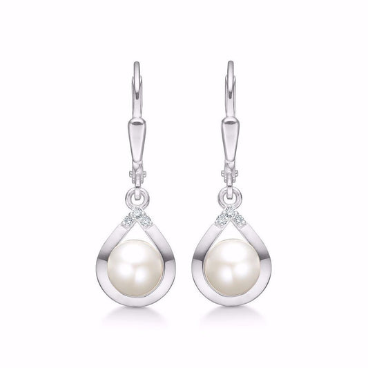 Snygga örhängen med diamanter och pärla