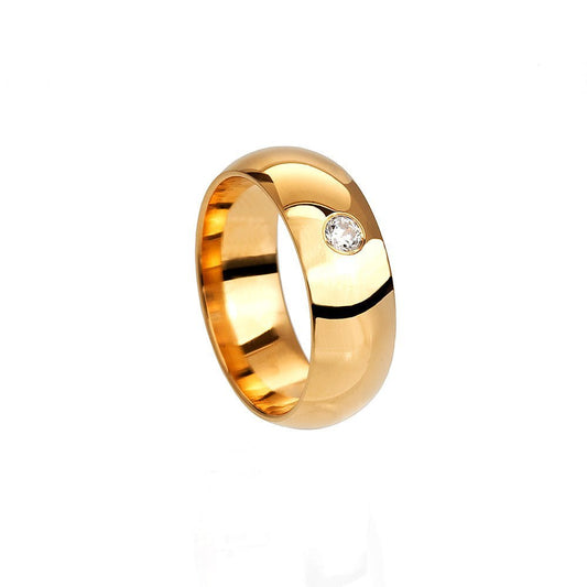 Vigselring bred blank med en diamant i 18k guld
