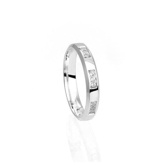 Vigselring smal med fin design och 9 diamanter i 18k vitguld