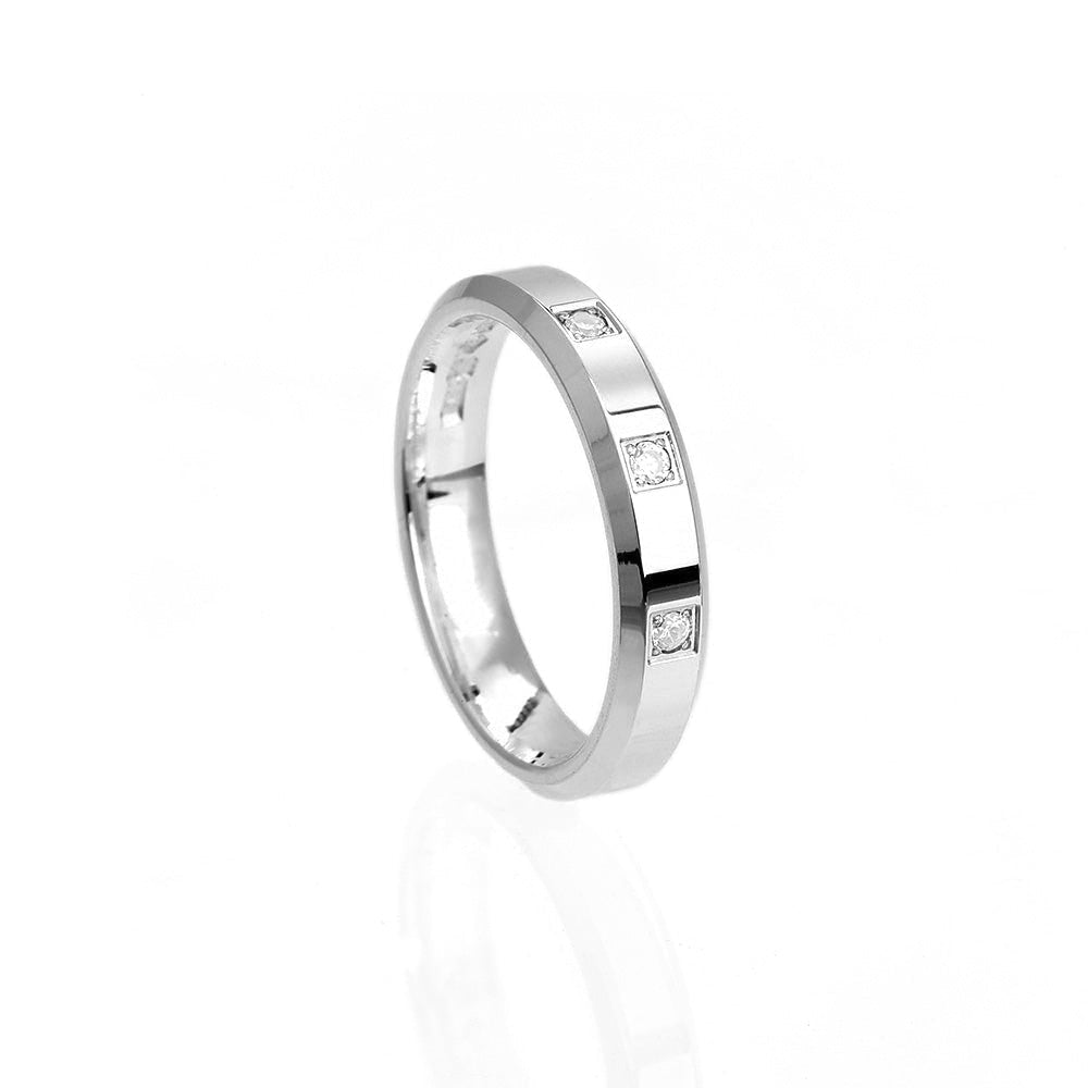 Elegant vigselring med 3 diamanter i 18k vitguld