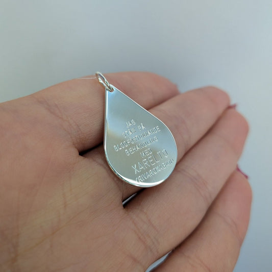 Xarelto bricka silver 27x19mm