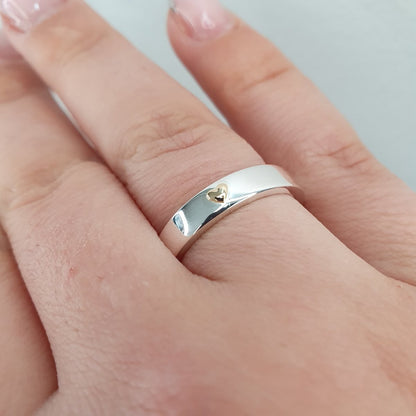 Silver förlovningsring med ett hjärta 18k guld